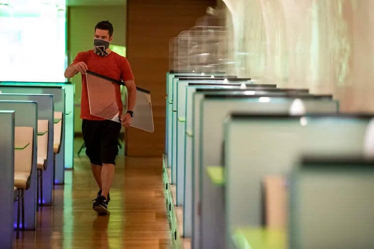 Darrell Shoaff installs clear acrylic dividers at Morimoto. Restaurants and bars, which were particularly hit hard by state shutdown orders, hired 1.5 million people in June.