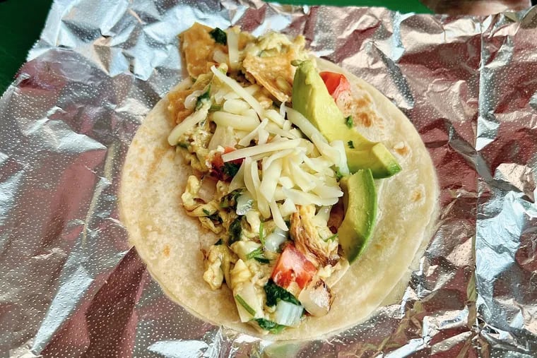 Migas breakfast taco, the Tex-Mex specialty with crumbled corn tortilla inside, at Taco Heart.