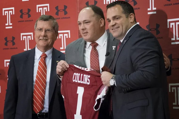 Wednesday December 14 2016 Temple Owls introduce Geoff Collins as their new head football coach at a morning press conference held at the Liacouras Center. Here, New Temple football coach Geoff Collins ,center, stands between university president Richard Englert left,and athletic director Pat Kraft who presented him with a team jersey bearing his name  ED HILLE / Staff Photographer