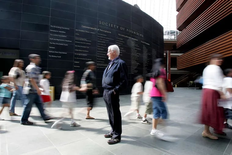 Philly Pops conductor Peter Nero watches as the crowds enter the Kimmel Center for a performance. (David Swanson/Inquirer)