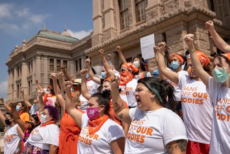 In this Sept. 1 photo, women protest against the six-week abortion ban at the Capitol in Austin, Texas.