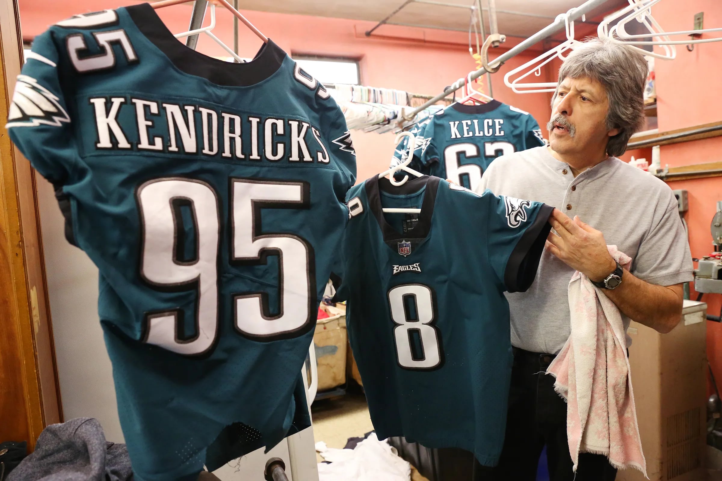 South Philadelphia cleaners responsible for keeping team's jerseys game day  ready - WHYY
