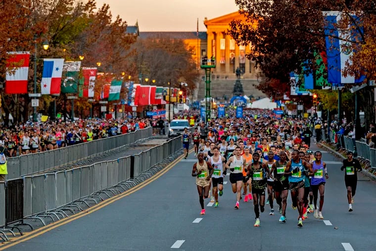 The start of the 30th annual Philadelphia Marathon  on the Benjamin Franklin Parkway Sunday, Nov. 19, 2023. Men’s winner Benard Kiptoo Koech is wearing bib #3 at center.