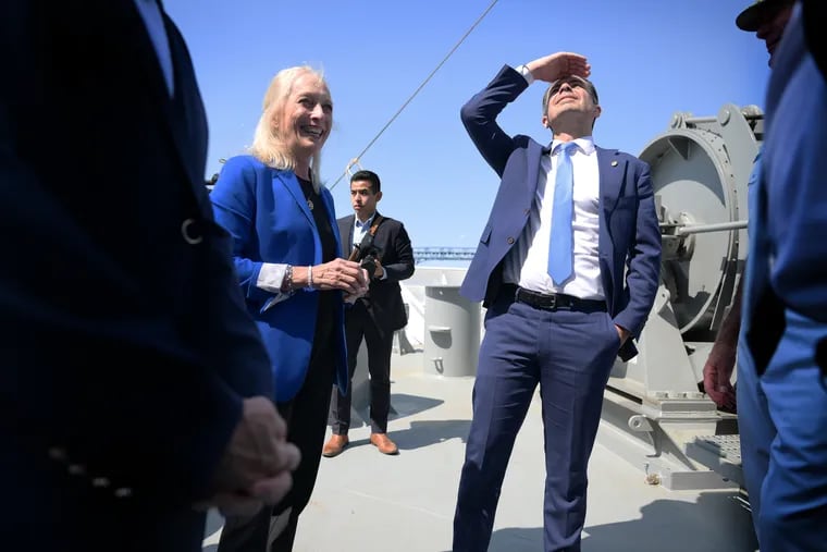 US Transportation Secretary Peter Buttigieg and Mary Gay Scanlon, United States Representative, take a close look at the newly built ship, Patriot State, during a tour at the Philly Shipyard.