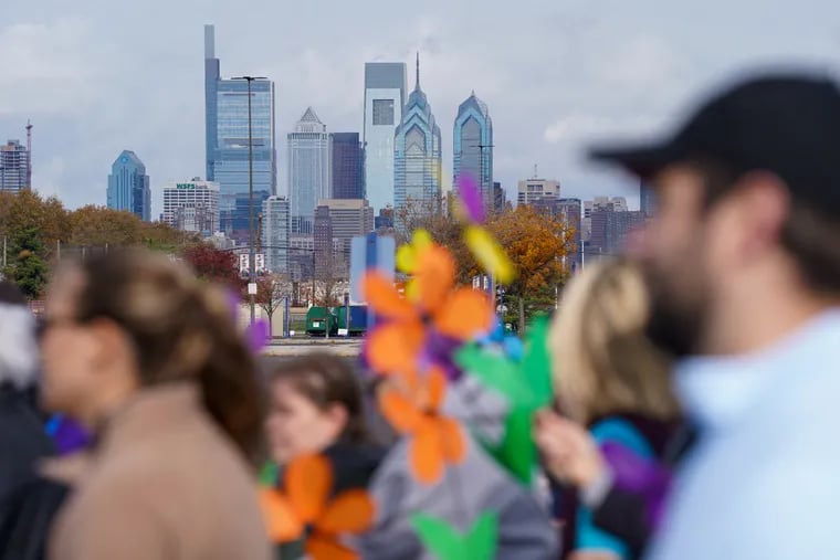 The Philadelphia skyline and participants at the Walk to End Alzheimer’s at Citizens Bank Park in Philadelphia, Pa., on November 13, 2021. Last week, the city was host to the biggest meetup for researchers around the world, the Alzheimer's Association International Conference.