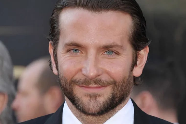 Actor Bradley Cooper arrives at the Oscars at the Dolby Theatre on Sunday Feb. 24, 2013, in Los Angeles. (Photo by John Shearer/Invision/AP)