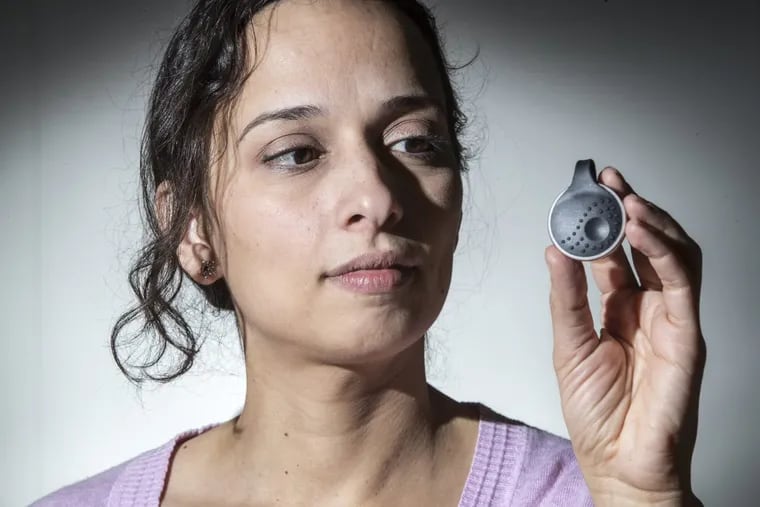 Yasmine Mustafa, a Philadelphia entrepreneur with her product &quot;Athena,&quot; a wearable device that allows women to send out a distress call via an app.