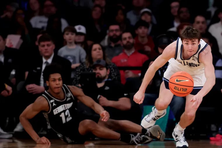 Georgetown's Jordan Riley pursuing a loose ball against Brendan Hausen of Villanova during the Big East Tournament on March 8.