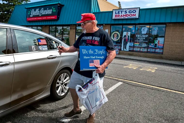 Robert Sherman, a Marine Corps veteran and retired union truck driver, bought two large flags and a few yard signs at the Let's Go Brandon shop.