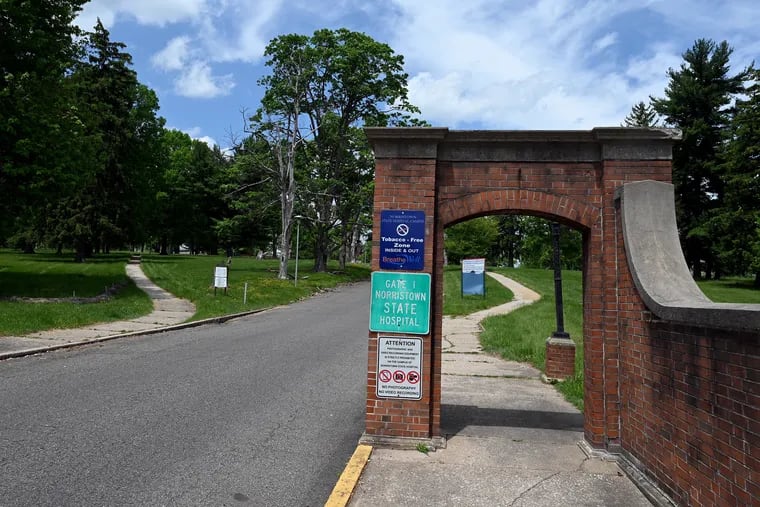 The main entrance to the Norristown State Hospital campus at West Sterigere and Stanbridge Streets in Norristown. A redevelopment proposal envisions a mixed-use community of residential, retail, and office space on the 68 acres the municipality owns adjacent to the campus.