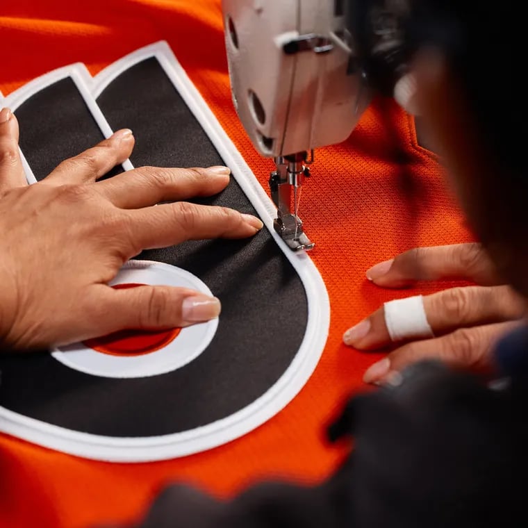 The Flyers crest is stitched on the front of one of the team's new Fanatics jerseys, which will be worn next season across the NHL.