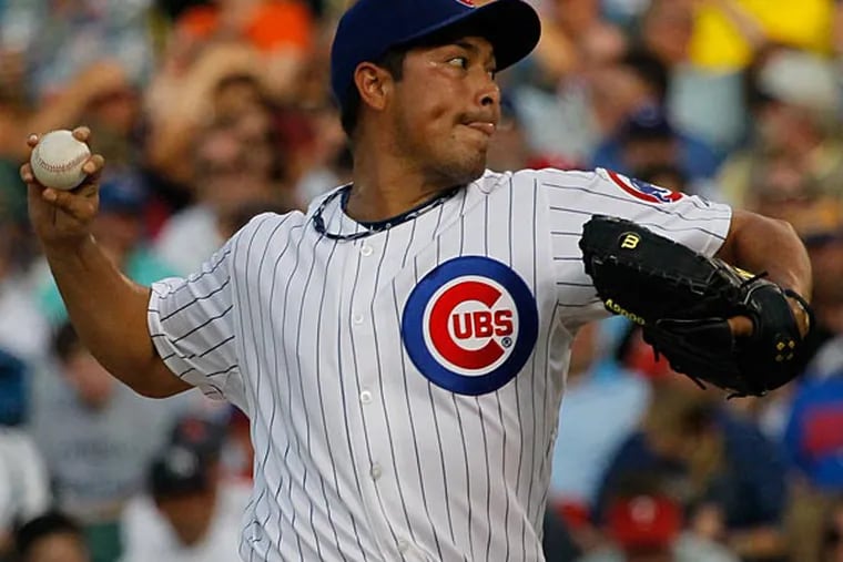 Chicago Cubs starting pitcher Rodrigo Lopez delivers during the first inning of a baseball game and 6-1 win over the Philadelphia Phillies Monday, July 18, 2011 in Chicago. (AP Photo/Charles Rex Arbogast)