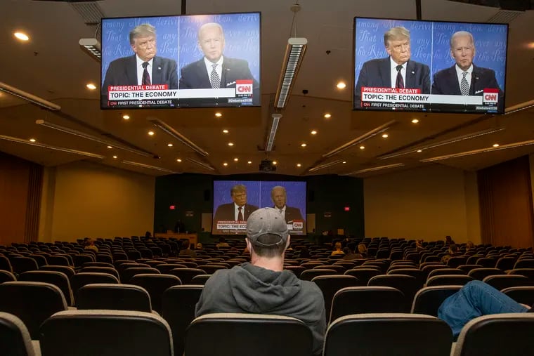 A socially distanced presidential debate watch party at Temple University on Sept. 29. Fewer than than 30 students watched from a lecture hall that holds more than 600 people.