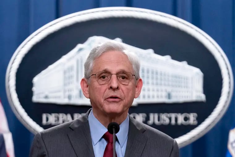 Attorney General Merrick Garland speaks during a news conference at the Department of Justice headquarters in June.