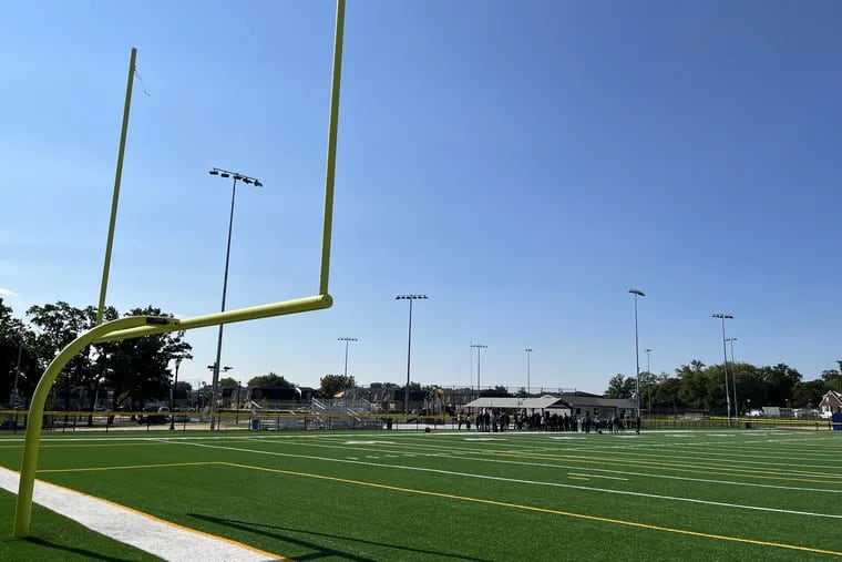 A new synthetic turf football field is part of a renovated youth sports facility at Whitman Park in Camden. The football field used to be a contaminated medical laboratory complex that was razed and cleaned.