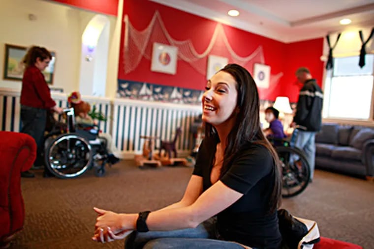 Sammi-Jo Danze, 25, of West Deptford, at the Ronald McDonald House in Camden, is joining in the American Girl Fashion Shows this weekend. Danze is the reigning Miss New Jersey. (David Swanson / Staff Photographer)