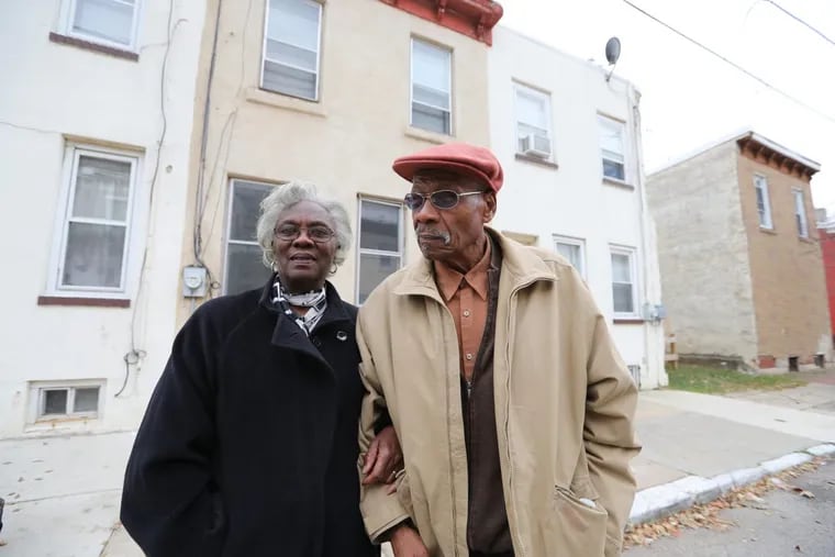Arthur and Betsy Deleaver in front of their Sharswood house. The city housing authority has taken it by eminent domain for a massive revitalization project. DAVID SWANSON / Staff Photographer