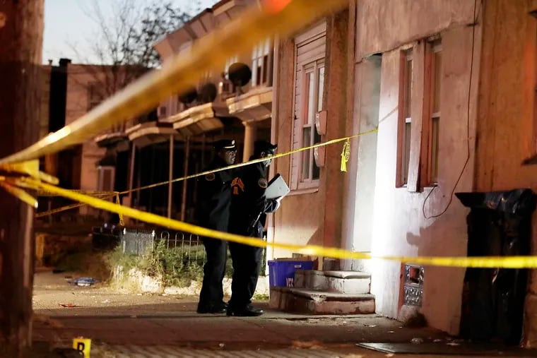 Police investigate the scene where a 10-year-old boy was shot on Nov. 6, 2019.