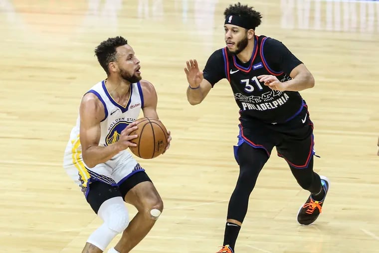 4th-quarter run powers Warriors to win over 76ers
