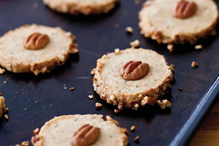The recipe for Black Pepper, Cheddar, and Pecan Shortbread is adaptable using different herbs and cheeses. (From “Basic to Brilliant, Y’all,” by Virginia Willis)