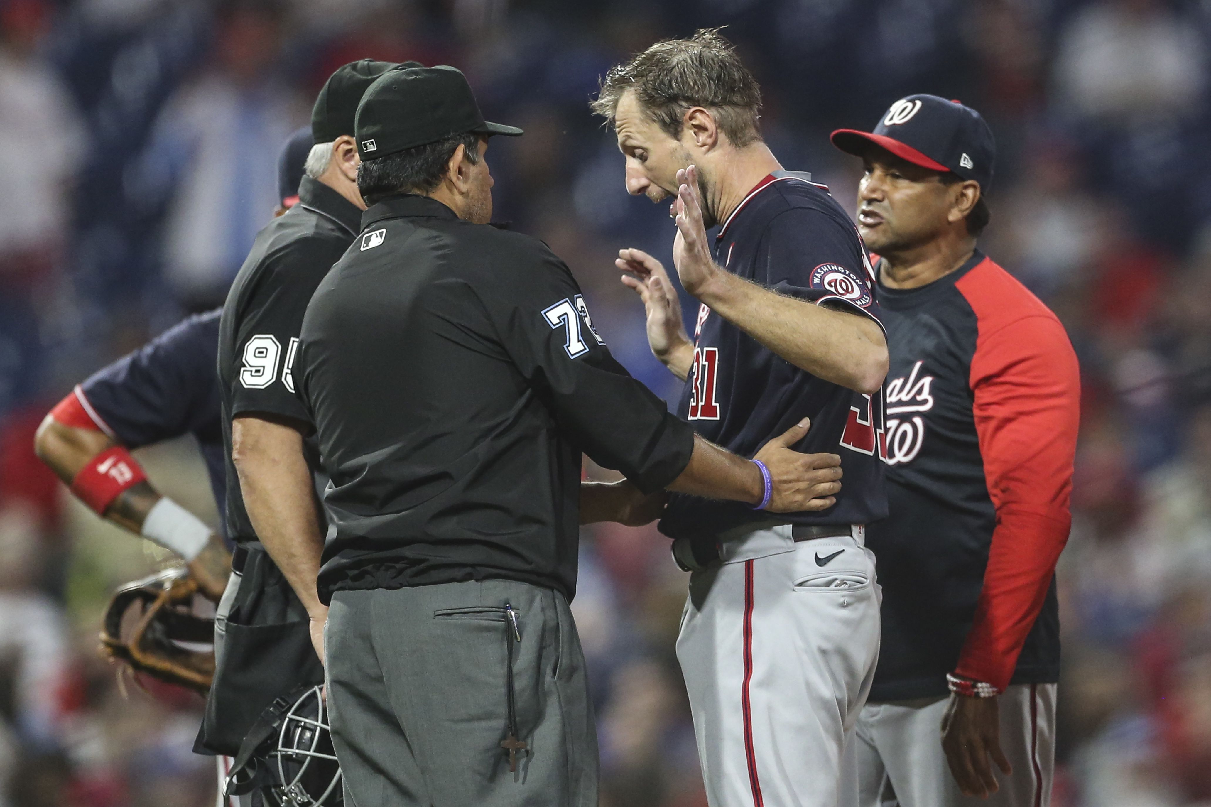Phillies' Joe Girardi ejected after repeated spats with Nationals, Max  Scherzer over foreign substance check 
