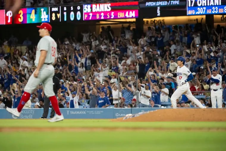 Los Angeles Dodgers' Shohei Ohtani (17) rounds the bases after hitting a solo home run during the eighth inning of a baseball game against the Philadelphia Phillies in Los Angeles, Monday, Aug. 5, 2024. (AP Photo/Kyusung Gong)