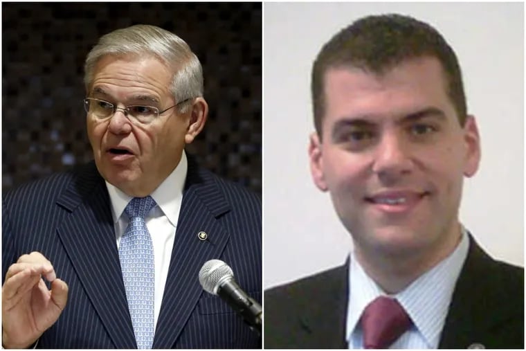 Sen. Bob Menendez's campaign chairman and top political adviser, Michael Soliman (right) has been lobbying members of Congress, including Menendez, on behalf of Qatar since 2015.