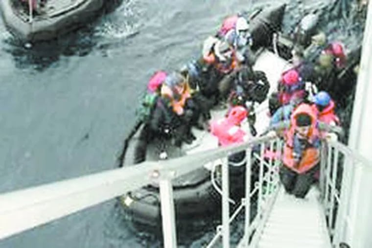 Cruise-ship passengers rescued off Antarctica board a Chilean navy boat. The navy said the ship was never at risk of sinking.