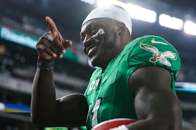 Eagles wide receiver A.J. Brown points to fans after the Sunday night victory against the Miami Dolphins at Lincoln Financial Field.