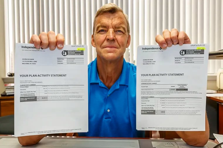 George Hahn holds the two bills from his health care providers, one for $339.44 and the other for $3,101.13, for two identical echocardiograms a year a part – both at Paoli Hospital. The cheaper one was done by a cardiology group, the second was considered a hospital procedure.