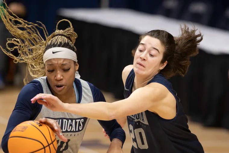 Villanova's Christina Dalce (left) and Maddy Siegrist of Villanova go after a loose ball in practice as they prepare for their first-round matchup with Cleveland State.