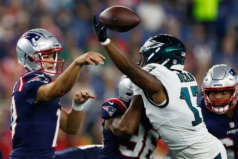 Nakobe Dean goes after the football against the New England Patriots quarterback Drake Maye in the second quarter on Aug. 15.