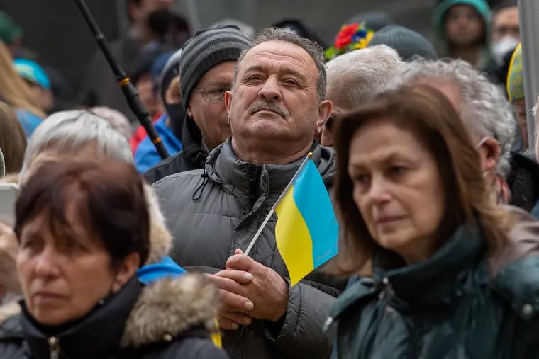 Members of the Ukraine community gather to protest at the Philadelphia City Hall in Philadelphia on Friday, Feb 25, 2022. Russian troops bore down on Ukraine’s capital Friday, with gunfire and explosions resonating ever closer to the government quarter, in an invasion of a democratic country that has fueled fears of wider war in Europe and triggered worldwide efforts to make Russia stop.