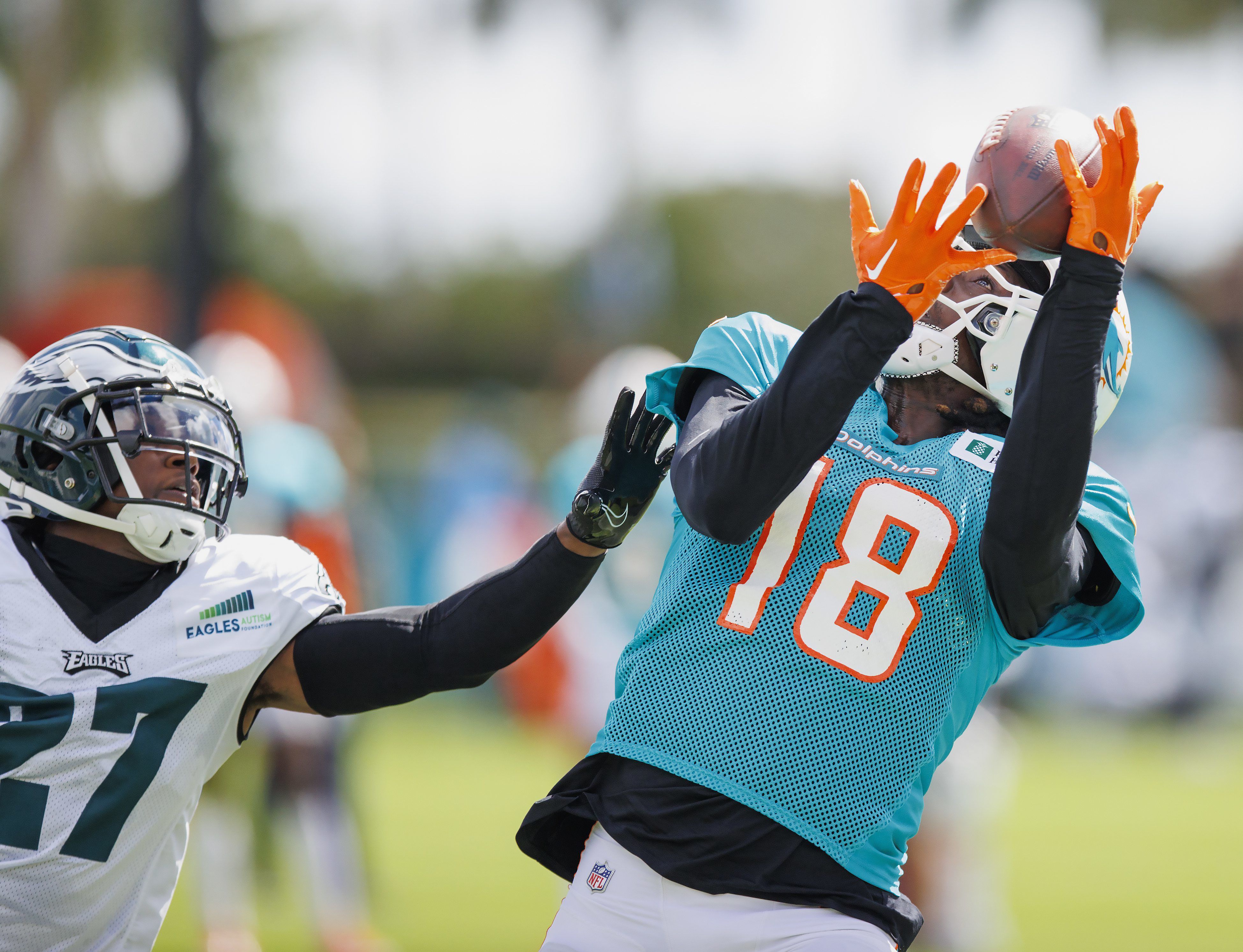 Miami Dolphins wide receiver Preston Williams (18) runs the ball