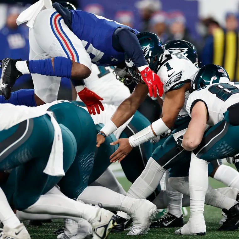 New York Giants linebacker Bobby Okereke jumps offsides during the Eagles' Tush Push during their Jan. 7 matchup last season.