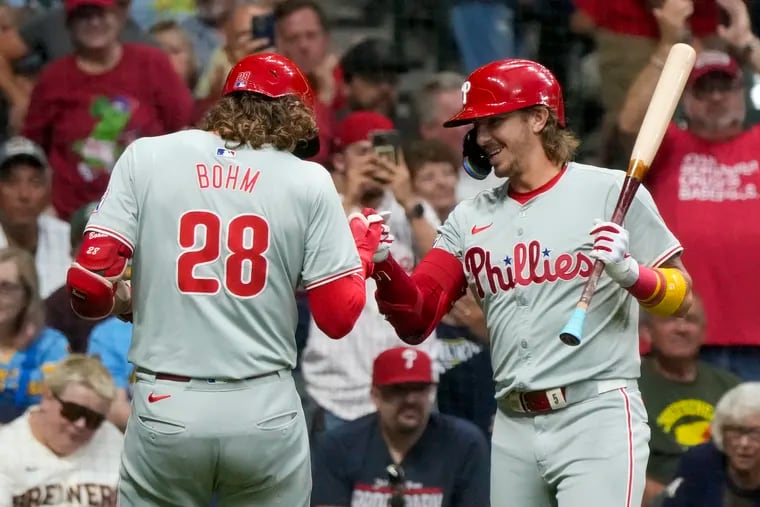 Alec Bohm (left) is greeted by Bryson Stott after his solo home run in the second inning.