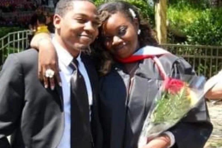 Armani Faison is seen in a family photo with his sister, Allandra Jean.