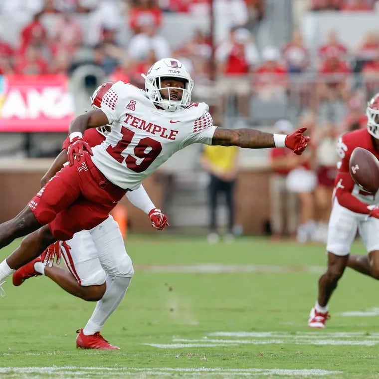 Temple wide receiver Antonio Jones (19) lunges for a pass during the Owls game against Oklahoma last Friday. Next up is a trip to Annapolis to take on American Athletic Conference foe Navy.