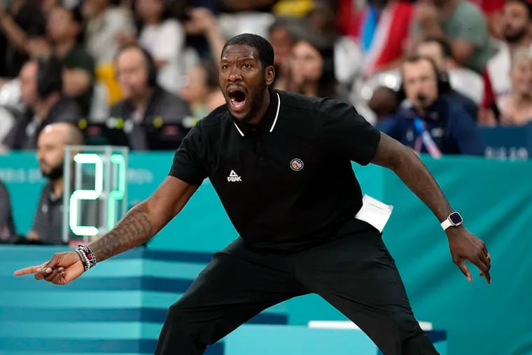 South Sudan head coach Royal Ivey gestures in a men's basketball game against Puerto Rico at the 2024 Summer Olympics on July 28.