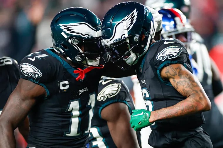 Eagles wide receiver A.J. Brown (11) celebrates at touchdown by DeVonta Smith on Christmas against the Giants.