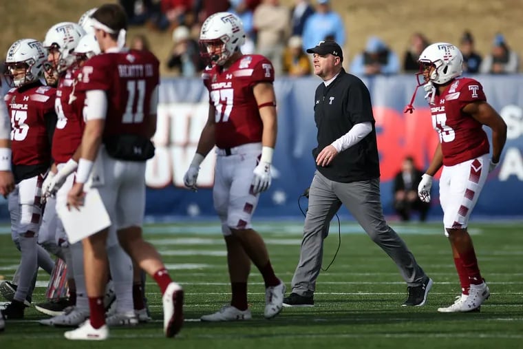 Temple head coach Rod Carey walking onto the field during a timeout in the Military Bowl against North Carolina.