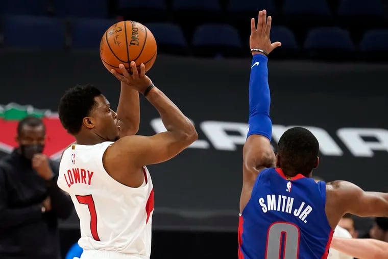 Toronto Raptors guard Kyle Lowry (7) shoots over Detroit Pistons guard Dennis Smith Jr. (0) during the second half of a game on March 3 in Tampa, Fla.