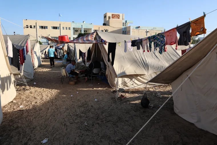 Displaced Palestinians shelter at a camp run by the United Nations Relief and Works Agency in Khan Younis on Thursday.