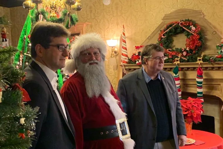 New Castle County Executive Matt Meyer (left) with Santa Claus and county councilman John Cartier at Rockwood Park and Museum earlier this month.