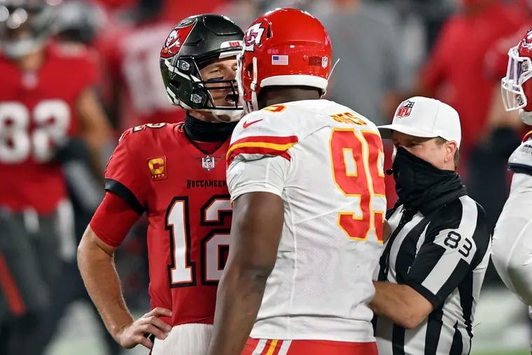 Buccaneers quarterback Tom Brady exchanges words with Chiefs defensive tackle Chris Jones in Kansas City's 27-24 victory.