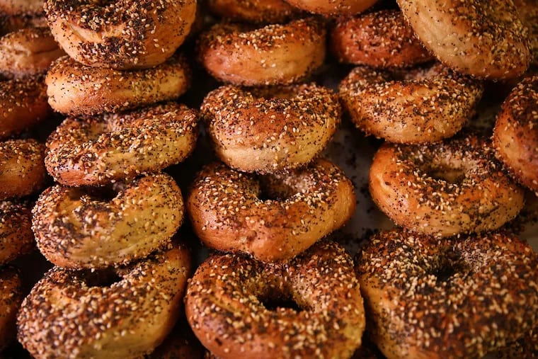 A tray of "everything" bagels cooling inside the Fishtown flagship of Philly Style Bagels, at 1451 E. Columbia Ave.