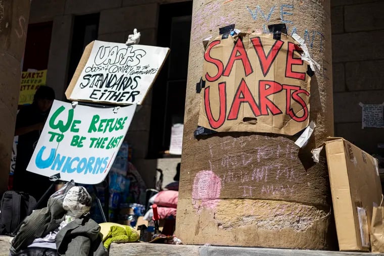 A sign reading “Save UArts” seen outside Dorrance Hamilton Hall at The University of the Arts in Philadelphia.