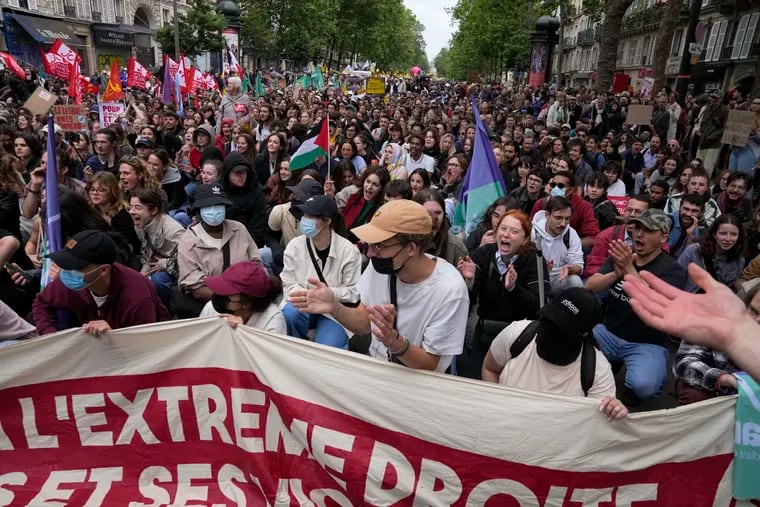 Protesters attend a rally in Paris, Saturday, June 15, 2024. Anti-racism groups joined French unions and a brand-new left-wing coalition in protests in Paris and across France on Saturday against the surging nationalist far-right.