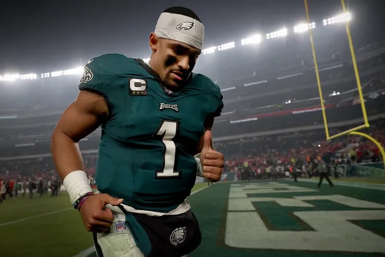 Eagles quarterback Jalen Hurts jogs off the field after the 42-19 loss to the 49ers at Lincoln Financial Field.