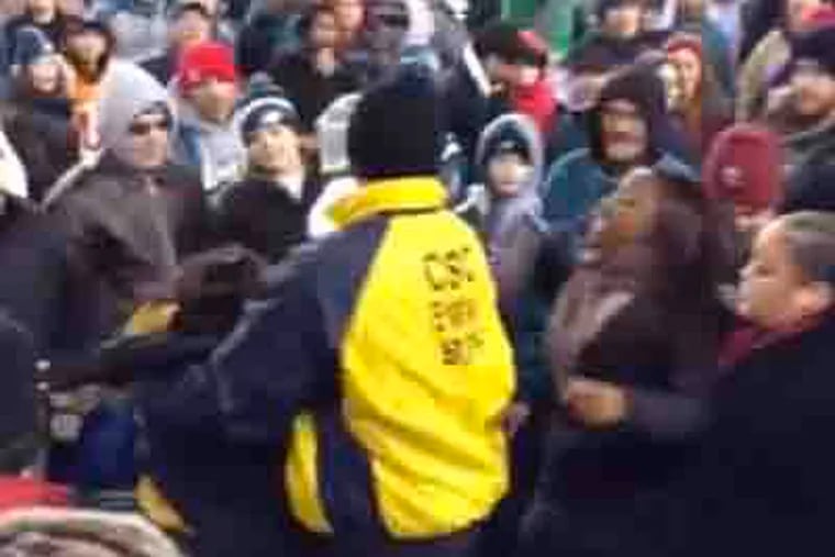 Women fight at the Eagles/Bengals game. Screenshot via YouTube